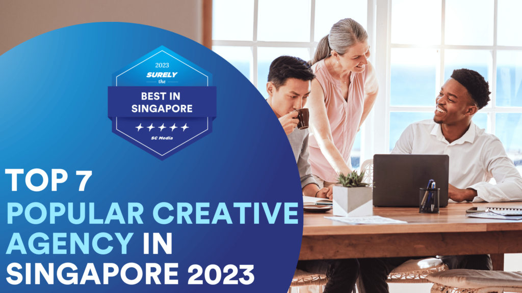 Surely's The Best in Singapore Digital Award Badge reads, 'Top 7 Popular Creative Agency in Singapore' On the right side, there are three people working together in the office